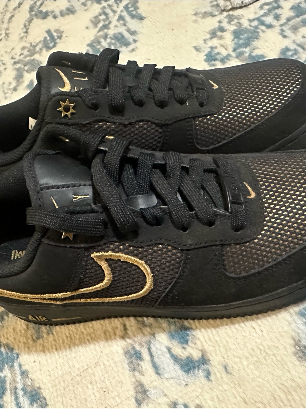 Nike women’s Air Force 1 Low — Black with Gold Accents